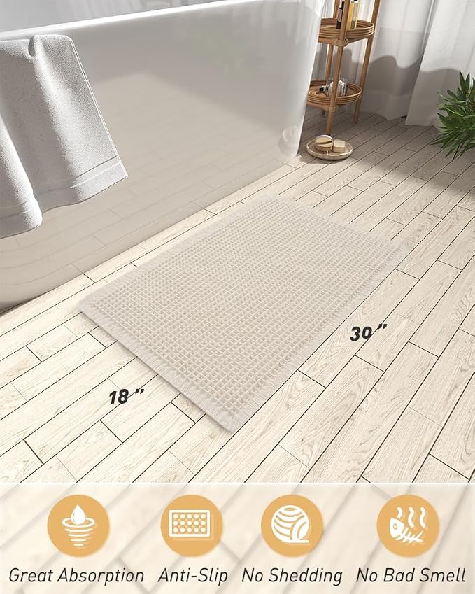 AMOAMI Upgraded Waffle Bath Mat, Super Absorbent Non Slip Bath Mats for Bathroom Floor, Machine Washable Bathroom Rugs with Tassels, Rubber Backed Bathroom Mats, Ultra Soft, 18" x 30", Pale Beige