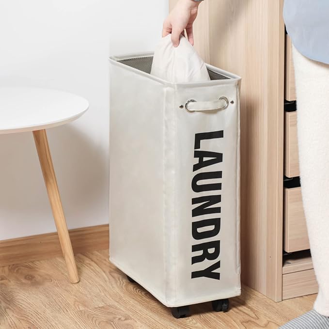 DOKEHOM 25" Slim Rolling Laundry Basket Hamper, Narrow on Wheels, Beige | Collapsible narrow laundry hamper with mesh drawstring closure. Foldable corner clothes storage bin for small spaces