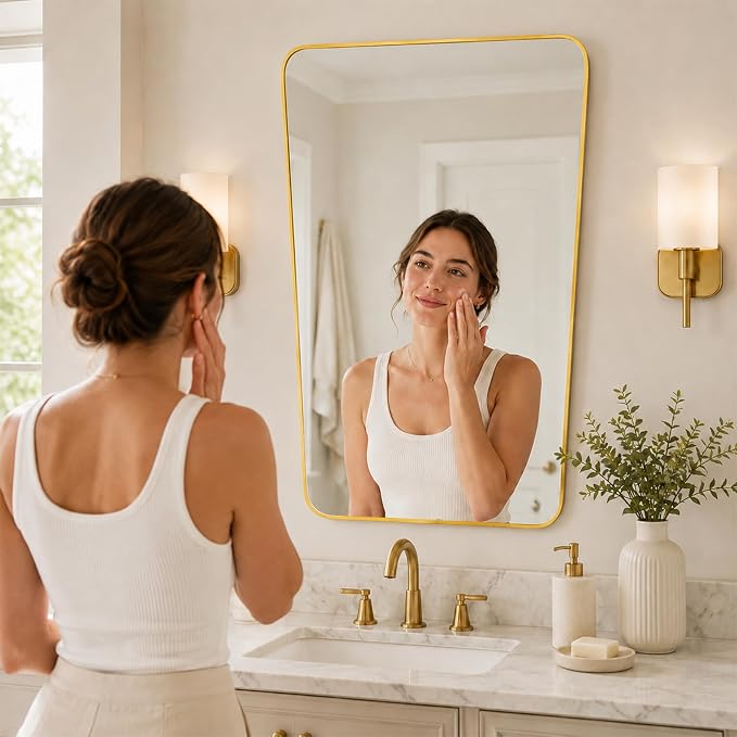 Brushed Gold Tapered Rounded Rectangle Bathroom Mirror, 24x36 Inch | Aluminum alloy frame, soft trapezoid shape, tempered glass, reversible vertical keyhole mount