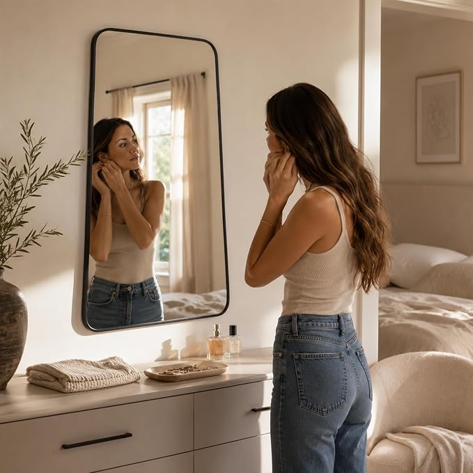 Matte Black Tapered Rounded Rectangle Bathroom Mirror, 24x36 Inch | Aluminum alloy frame, soft trapezoid shape, tempered glass, reversible vertical keyhole mount