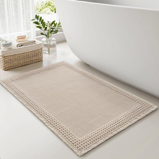 RESARE Waffle Bath Mat for Bathroom Non Slip Bathroom Rugs 18x30 Pale Beige | Absorbent Boho Bathroom Floor Mats Machine Washable Quick Dry, Soft Solid Bath Rugs with Tassels, Ideal Farmhouse Home Decor