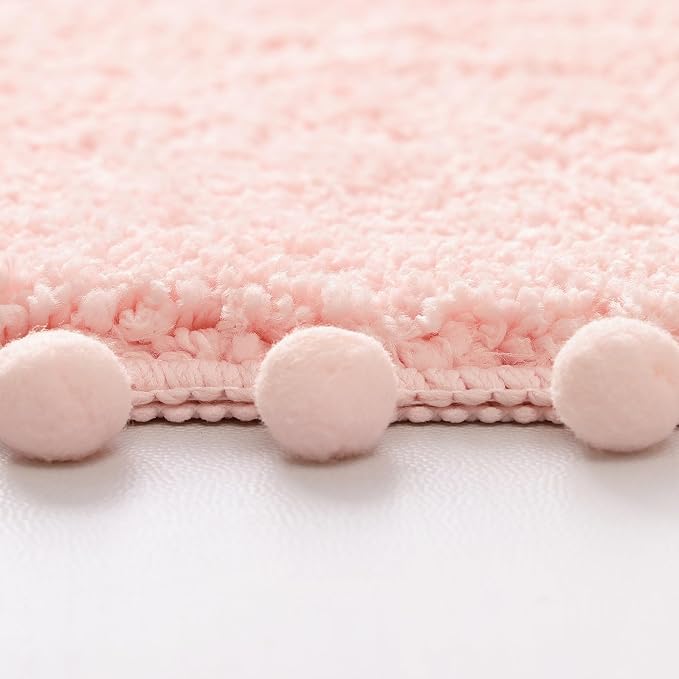 YIRDDEO Oval Rug for Bathroom, Cute Boho Bath Mat with Pom, Blush | Soft Plush, Absorbent, Quick Dry, Machine Washable, Non Slip Bath Mat for Bathroom Shower Floor Home Decor