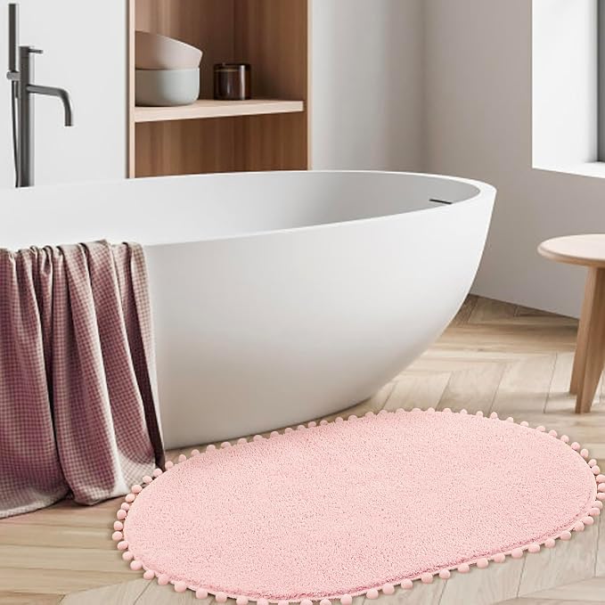 YIRDDEO Oval Rug for Bathroom, Cute Boho Bath Mat with Pom, Blush | Soft Plush, Absorbent, Quick Dry, Machine Washable, Non Slip Bath Mat for Bathroom Shower Floor Home Decor