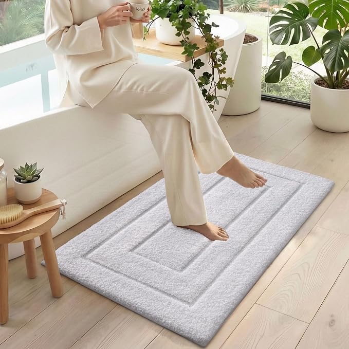 DEXI Bathroom Rugs 24x16, Non-Slip and Absorbent Bath Mat, White | Machine Washable, Soft Plush Microfiber Bathmat with Rubber Back, Quick Dry Small Rug for Shower, Tub, Sink