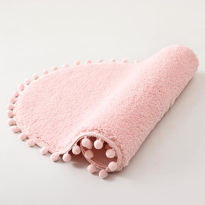 YIRDDEO Oval Rug for Bathroom, Cute Boho Bath Mat with Pom, Blush | Soft Plush, Absorbent, Quick Dry, Machine Washable, Non Slip Bath Mat for Bathroom Shower Floor Home Decor
