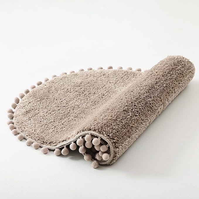 YIRDDEO Oval Rug for Bathroom, Cute Boho Bath Mat with Pom, Oatmeal | Soft Plush, Absorbent, Quick Dry, Machine Washable, Non Slip Bath Mat for Bathroom Shower Floor Home Decor