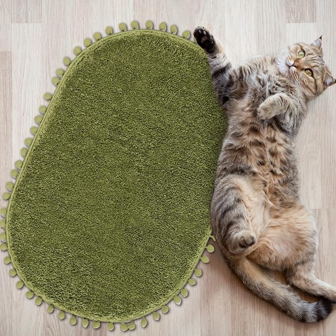 YIRDDEO Oval Rug for Bathroom, Cute Boho Bath Mat with Pom, Olive Green | Soft Plush, Absorbent, Quick Dry, Machine Washable, Non Slip Bath Mat for Bathroom Shower Floor Home Decor