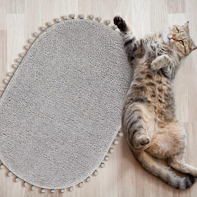 YIRDDEO Oval Rug for Bathroom, Cute Boho Bath Mat with Pom, Light Grey | Soft Plush, Absorbent, Quick Dry, Machine Washable, Non Slip Bath Mat for Bathroom Shower Floor Home Decor