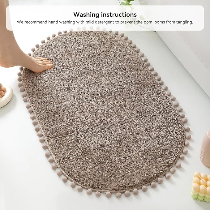 YIRDDEO Oval Rug for Bathroom, Cute Boho Bath Mat with Pom, Oatmeal | Soft Plush, Absorbent, Quick Dry, Machine Washable, Non Slip Bath Mat for Bathroom Shower Floor Home Decor
