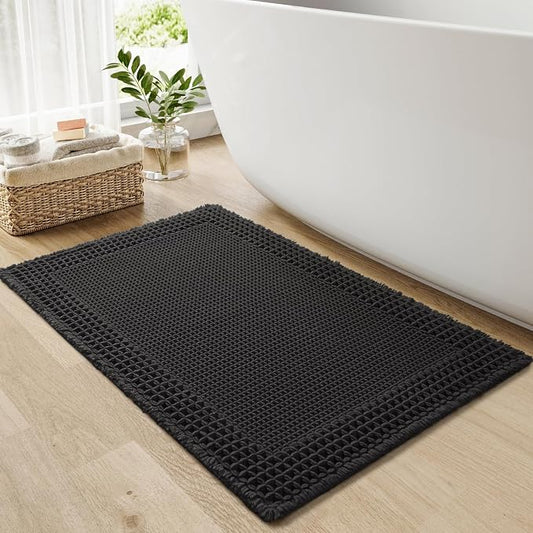 RESARE Waffle Bath Mat for Bathroom, Non Slip Bathroom Rugs 17"x24" Black | Absorbent Boho Bathroom Floor Mats Machine Washable Quick Dry, Soft Solid Bath Rugs with Tassels, Ideal Farmhouse Home Decor