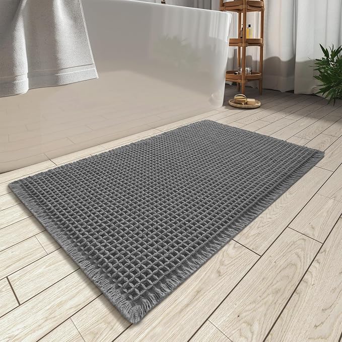 AMOAMI Upgraded Waffle Bath Mat, Super Absorbent Non Slip Bath Mats for Bathroom Floor, Washable Bathroom Rugs with Tassels, Rubber Backed Bathroom Mats, Ultra Soft, 20" x 32", Dark Grey