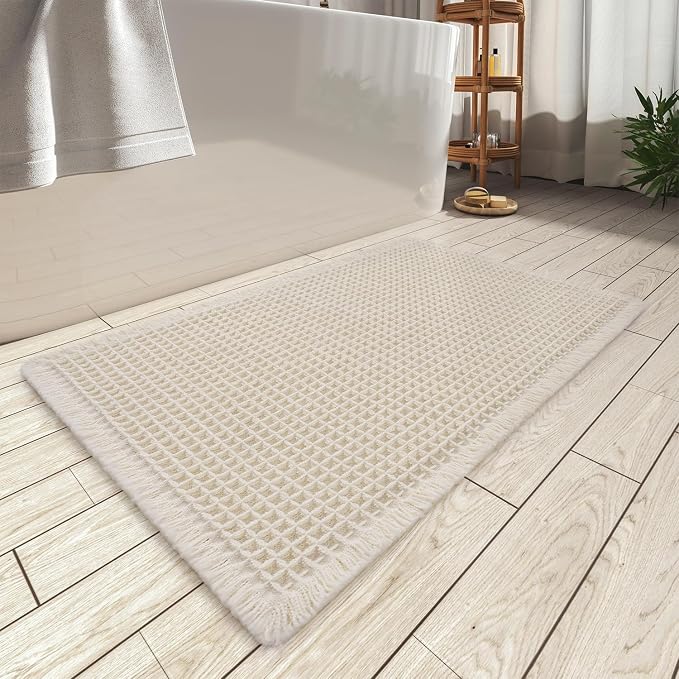 AMOAMI Upgraded Waffle Bath Mat, Super Absorbent Non Slip Bath Mats for Bathroom Floor, Machine Washable Bathroom Rugs with Tassels, Rubber Backed Bathroom Mats, Ultra Soft, 18" x 30", Pale Beige
