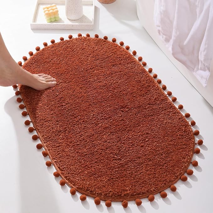 YIRDDEO Oval Rug for Bathroom, Cute Boho Bath Mat with Pom, Terracotta | Soft Plush, Absorbent, Quick Dry, Machine Washable, Non Slip Bath Mat for Bathroom Shower Floor Home Decor