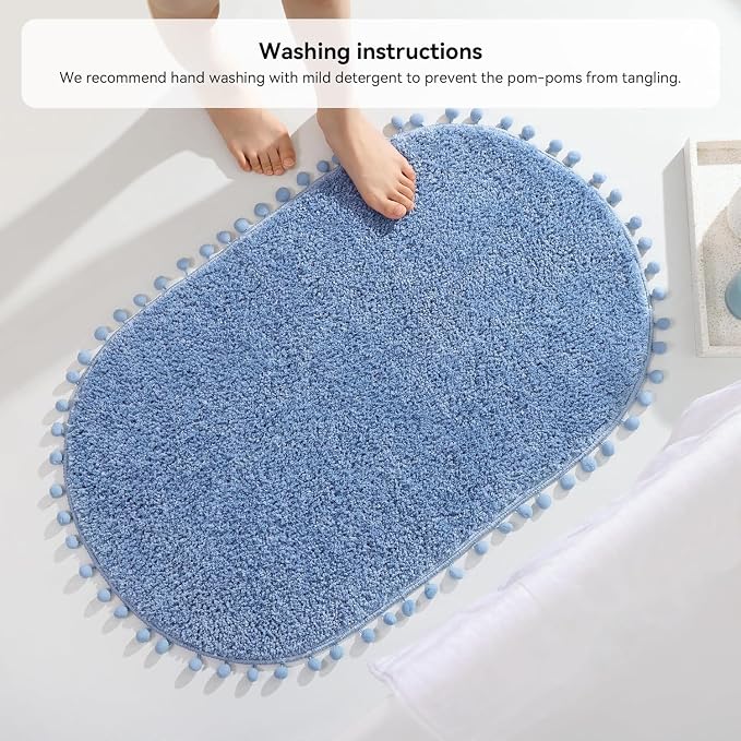 YIRDDEO Oval Rug for Bathroom, Cute Boho Bath Mat with Pom, Dusty Blue | Soft Plush, Absorbent, Quick Dry, Machine Washable, Non Slip Bath Mat for Bathroom Shower Floor Home Decor