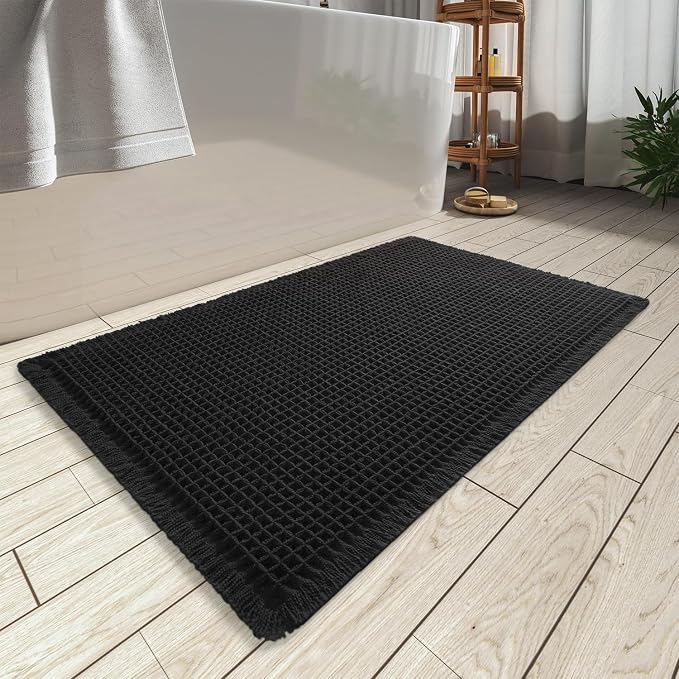 AMOAMI Upgraded Waffle Bath Mat, Super Absorbent Non Slip Bath Mats for Bathroom Floor, Washable Bathroom Rugs with Tassels, Rubber Backed Bathroom Mats, Ultra Soft, 24" x 36", Black