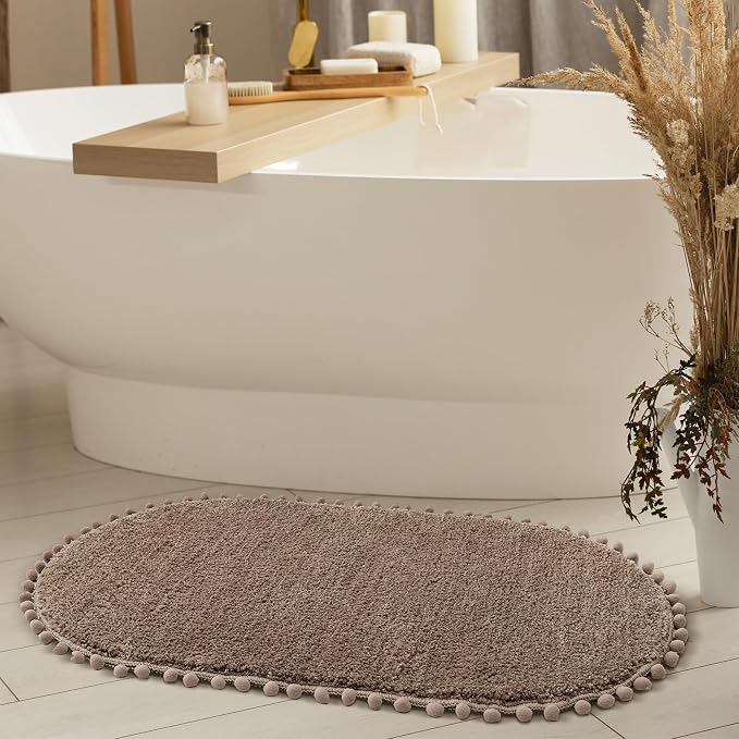 YIRDDEO Oval Rug for Bathroom, Cute Boho Bath Mat with Pom, Oatmeal | Soft Plush, Absorbent, Quick Dry, Machine Washable, Non Slip Bath Mat for Bathroom Shower Floor Home Decor