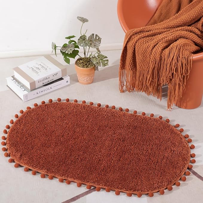 YIRDDEO Oval Rug for Bathroom, Cute Boho Bath Mat with Pom, Terracotta | Soft Plush, Absorbent, Quick Dry, Machine Washable, Non Slip Bath Mat for Bathroom Shower Floor Home Decor
