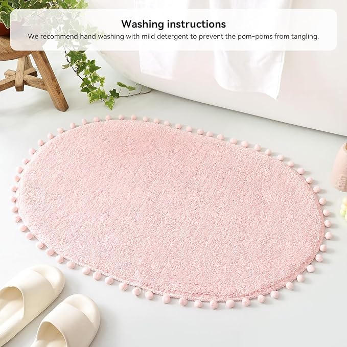 YIRDDEO Oval Rug for Bathroom, Cute Boho Bath Mat with Pom, Blush | Soft Plush, Absorbent, Quick Dry, Machine Washable, Non Slip Bath Mat for Bathroom Shower Floor Home Decor