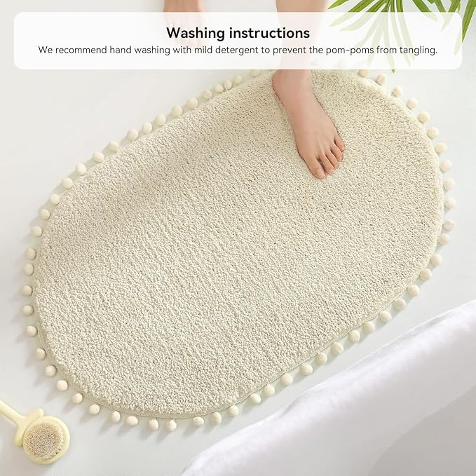 YIRDDEO Oval Rug for Bathroom, Cute Boho Bath Mat with Pom, Cream White | Soft Plush, Absorbent, Quick Dry, Machine Washable, Non Slip Bath Mat for Bathroom Shower Floor Home Decor