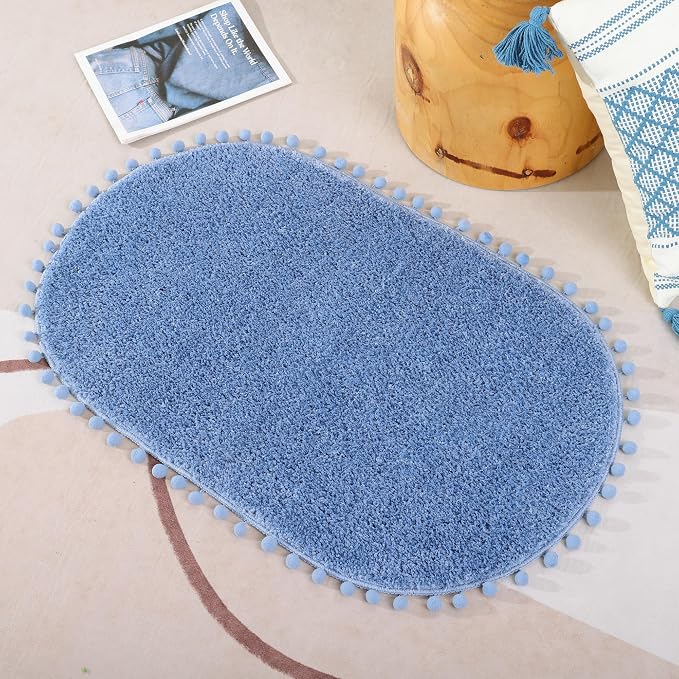 YIRDDEO Oval Rug for Bathroom, Cute Boho Bath Mat with Pom, Dusty Blue | Soft Plush, Absorbent, Quick Dry, Machine Washable, Non Slip Bath Mat for Bathroom Shower Floor Home Decor