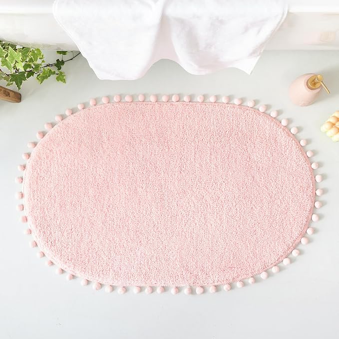 YIRDDEO Oval Rug for Bathroom, Cute Boho Bath Mat with Pom, Blush | Soft Plush, Absorbent, Quick Dry, Machine Washable, Non Slip Bath Mat for Bathroom Shower Floor Home Decor