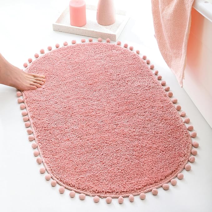 YIRDDEO Oval Rug for Bathroom, Cute Boho Bath Mat with Pom, Dusty Pink | Soft Plush, Absorbent, Quick Dry, Machine Washable, Non Slip Bath Mat for Bathroom Shower Floor Home Decor