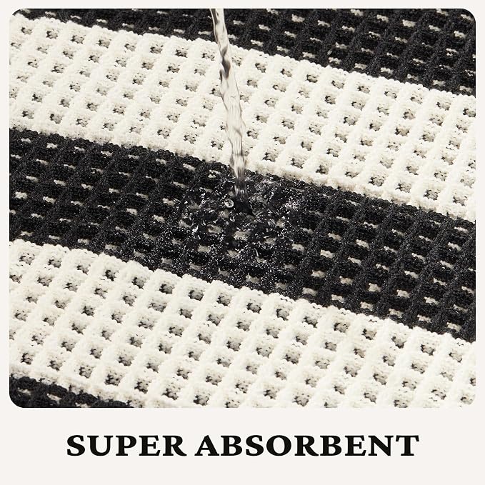 MatEssenz Black and White Striped Bath Mat 2x3 Ft, Super Absorbent Non Slip Bathroom Rug, Rubber Backed Waffle Bath Mat, Machine Washable Soft Bathroom Floor Rug with Tassels