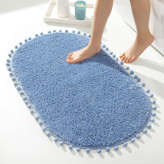 YIRDDEO Oval Rug for Bathroom, Cute Boho Bath Mat with Pom, Dusty Blue | Soft Plush, Absorbent, Quick Dry, Machine Washable, Non Slip Bath Mat for Bathroom Shower Floor Home Decor