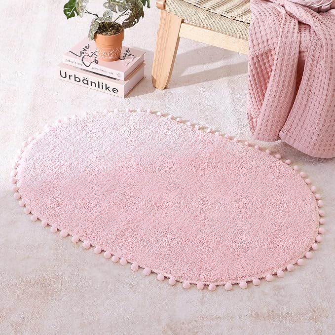 YIRDDEO Oval Rug for Bathroom, Cute Boho Bath Mat with Pom, Pink, 36"x24" | Soft Plush, Absorbent, Quick Dry, Machine Washable, Non Slip Bath Mat for Bathroom Shower Floor Home Decor