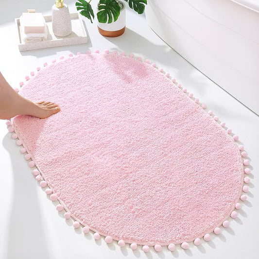 YIRDDEO Oval Rug for Bathroom, Cute Boho Bath Mat with Pom, Pink, 36"x24" | Soft Plush, Absorbent, Quick Dry, Machine Washable, Non Slip Bath Mat for Bathroom Shower Floor Home Decor