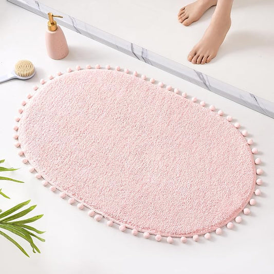 YIRDDEO Oval Rug for Bathroom, Cute Boho Bath Mat with Pom, Blush | Soft Plush, Absorbent, Quick Dry, Machine Washable, Non Slip Bath Mat for Bathroom Shower Floor Home Decor