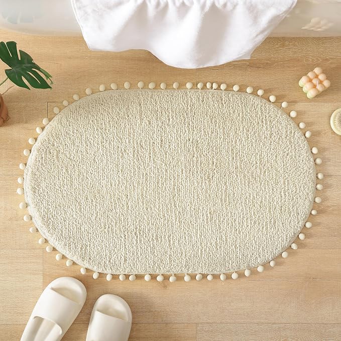YIRDDEO Oval Rug for Bathroom, Cute Boho Bath Mat with Pom, Cream White | Soft Plush, Absorbent, Quick Dry, Machine Washable, Non Slip Bath Mat for Bathroom Shower Floor Home Decor