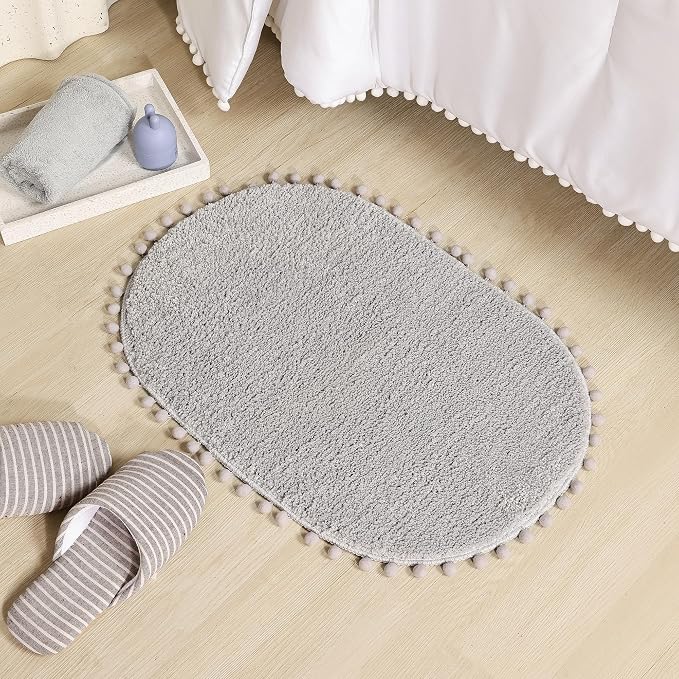 YIRDDEO Oval Rug for Bathroom, Cute Boho Bath Mat with Pom, Light Grey | Soft Plush, Absorbent, Quick Dry, Machine Washable, Non Slip Bath Mat for Bathroom Shower Floor Home Decor